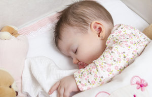 when to stop waking baby at night to feed